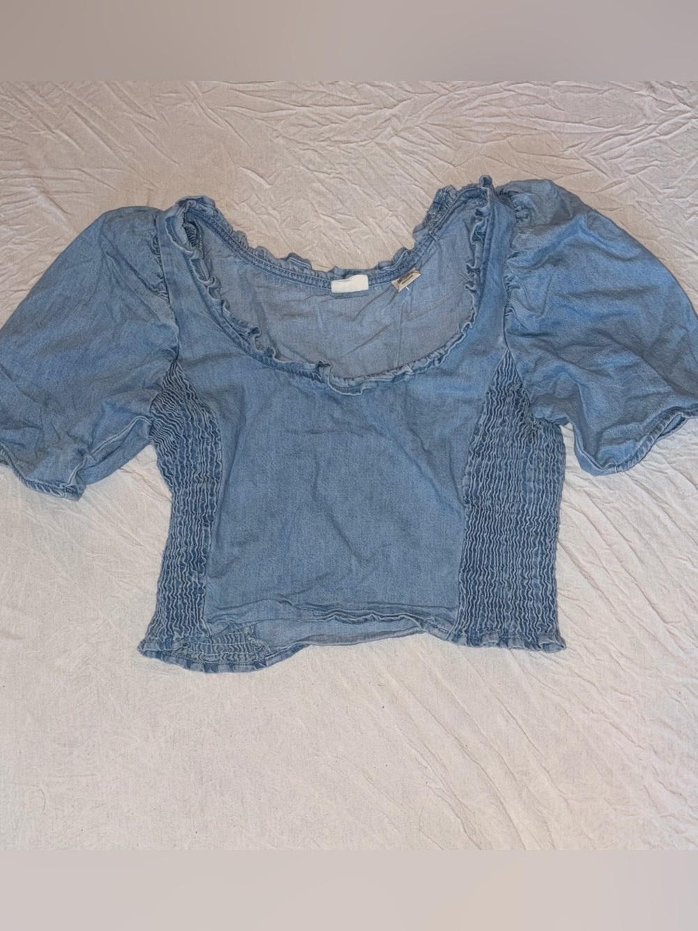 Levi’s denim crop top with puff sleeves and ruched side